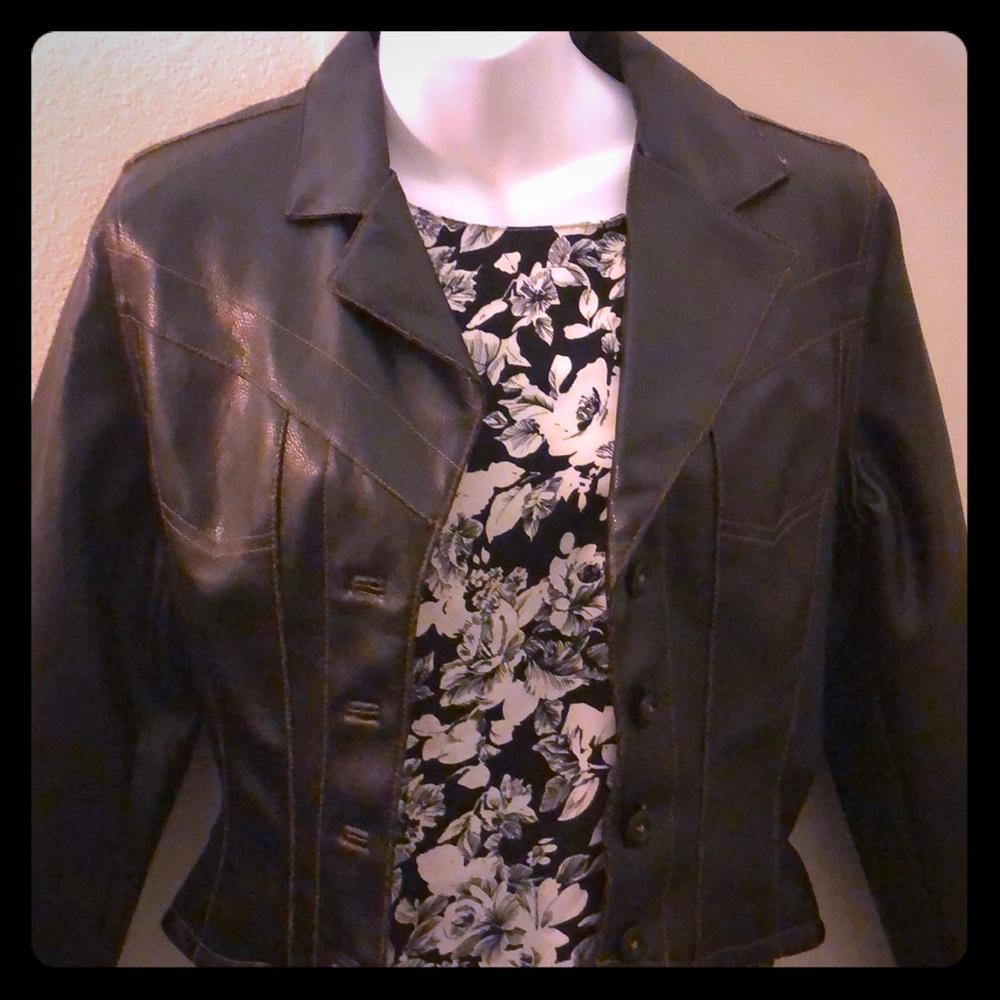 Small Faux leather jacket. Super cute !!!